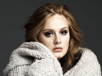 Watch ADELE Perform new song 'When We Were Young'