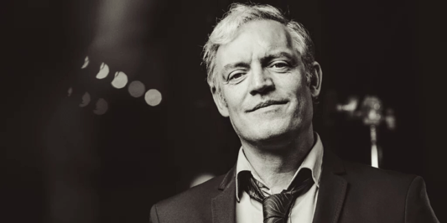 INTERVIEW: Neil McCormick – From Killing Bono to #Zero 1