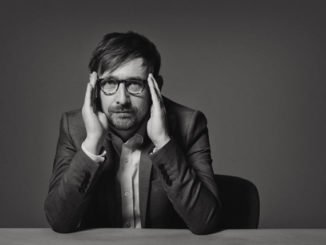 THE DIVINE COMEDY release video for new single 'Queuejumper' - Watch Now