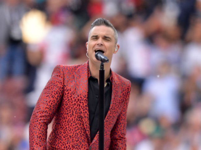 ROBBIE WILLIAMS' biggest hit 'Angels' is about him communicating with spirits as a child 