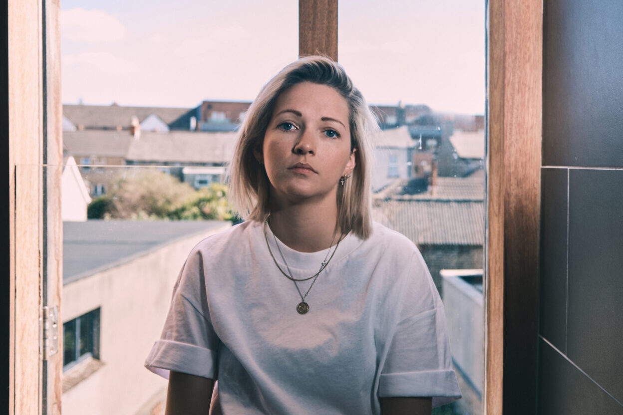 Dublin alt-folk riser AILBHE REDDY shares poignant new effort 'Looking Happy' 
