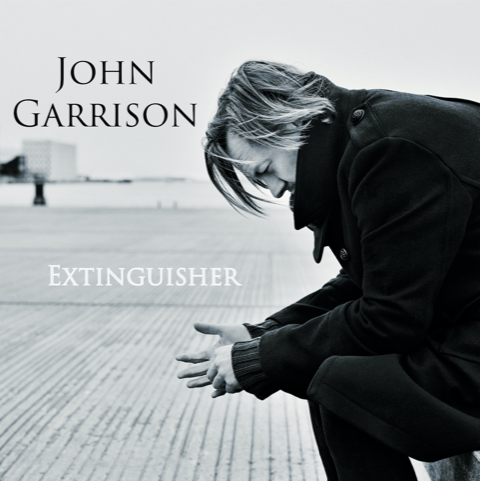 JOHN GARRISON shares video for ‘Blissfully Ignorant’ from new album ‘Extinguisher’ 