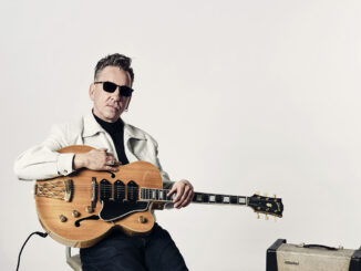 RICHARD HAWLEY cleans the streets of Sheffield in the video for new single 'Prism In Jeans' 81 Richard Hawley