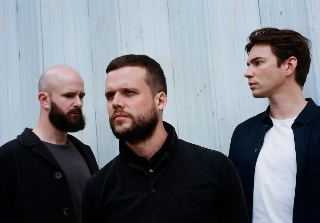 INTERVIEW: White Lies’ Charles Cave on new album 'As I Try Not To Fall Apart'